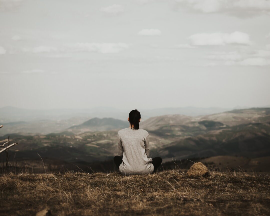 person meditating for success