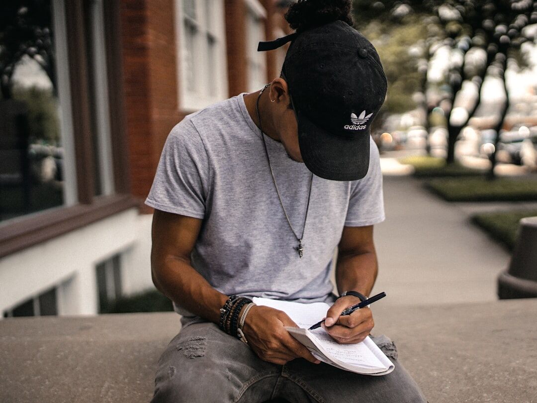 person writing journal