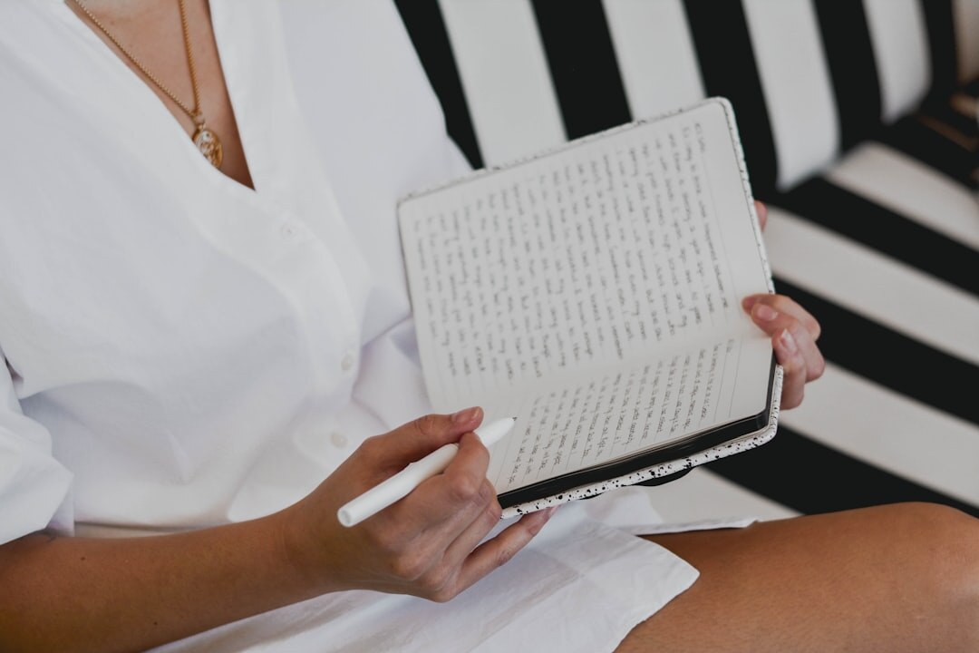 person journaling goals